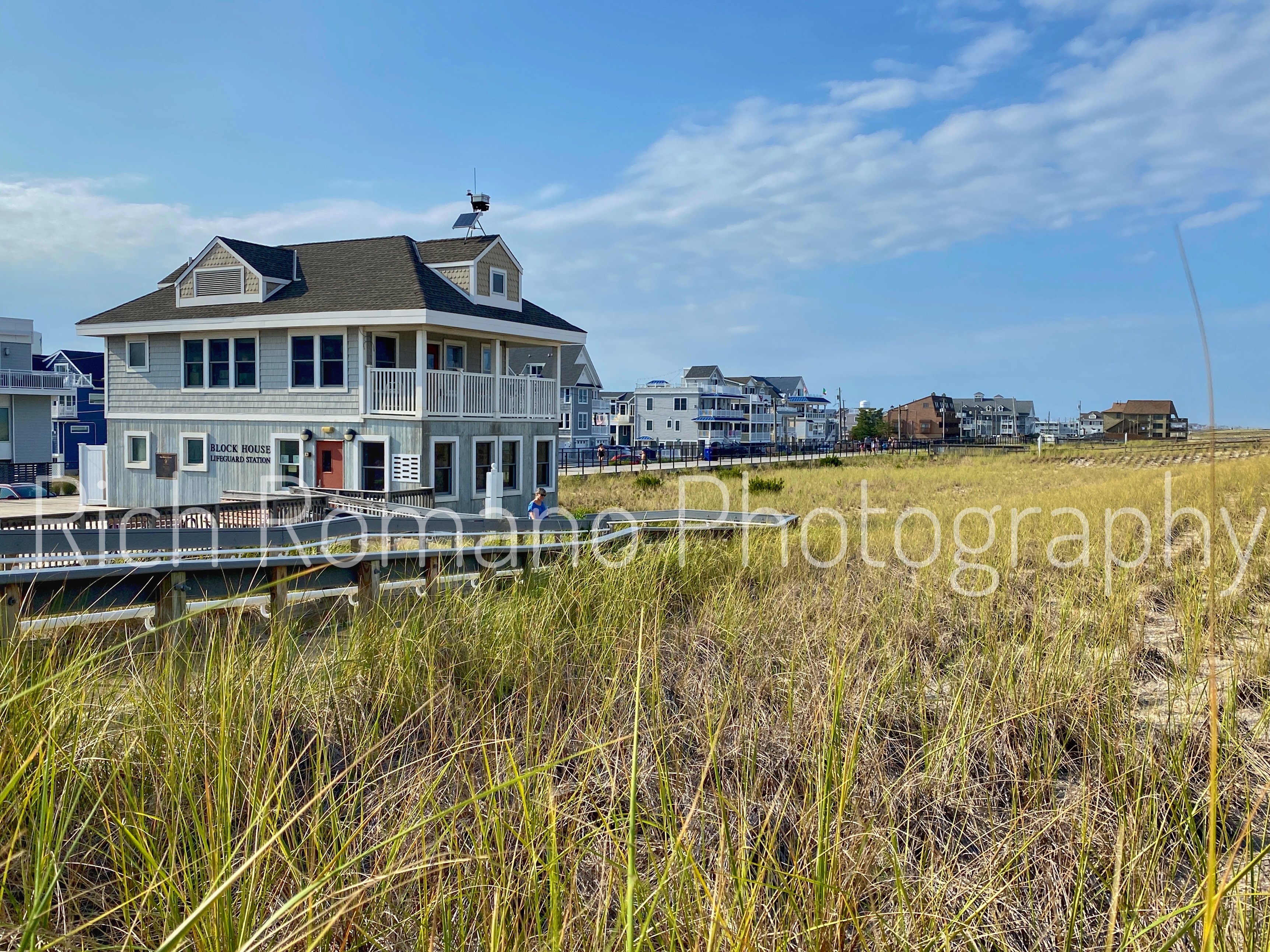 charming lifeguard station house on the beach in front of dune grass on jersey shore new jersey